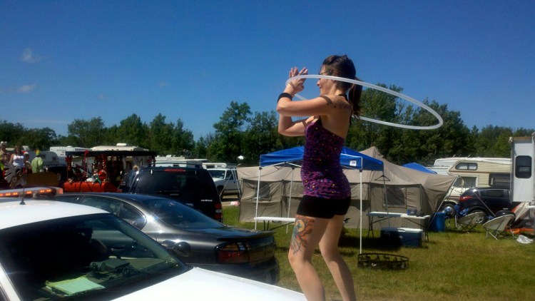 Hula Hooper at Moondance Jam on Police Car